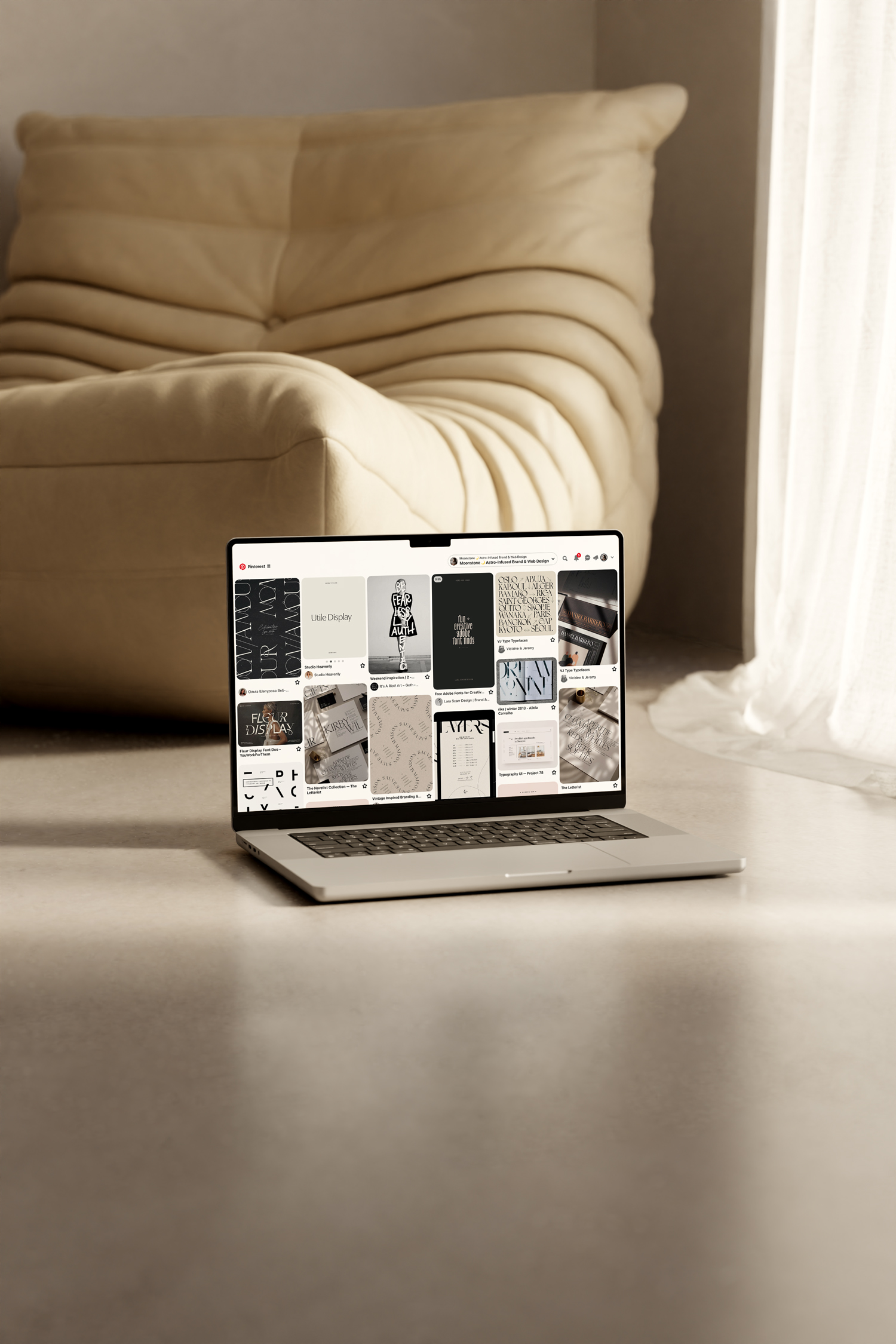 A laptop mockup displaying a Pinterest mood board full of different typography examples.